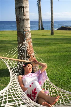 15 Ways to Earn More Money relaxing woman on beach photo: Woman_Relaxing_At_Beach.jpg